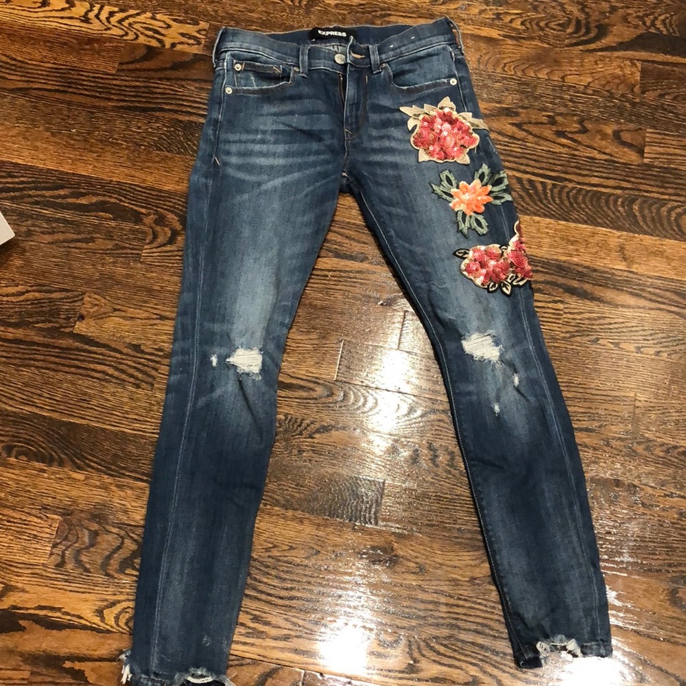 Express mid rise jeans with flower embellishments